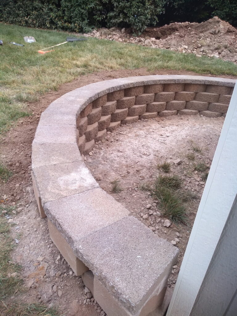 Professional stone retaining wall installation in Roanoke VA by Lopez Landscaping.