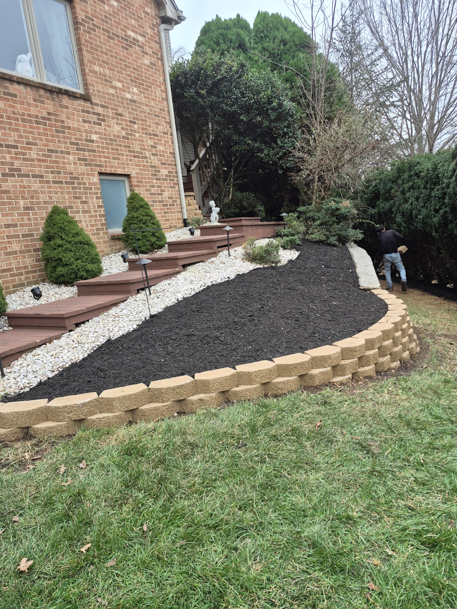 Professional stone retaining wall installation in Roanoke VA by Lopez Landscaping.
