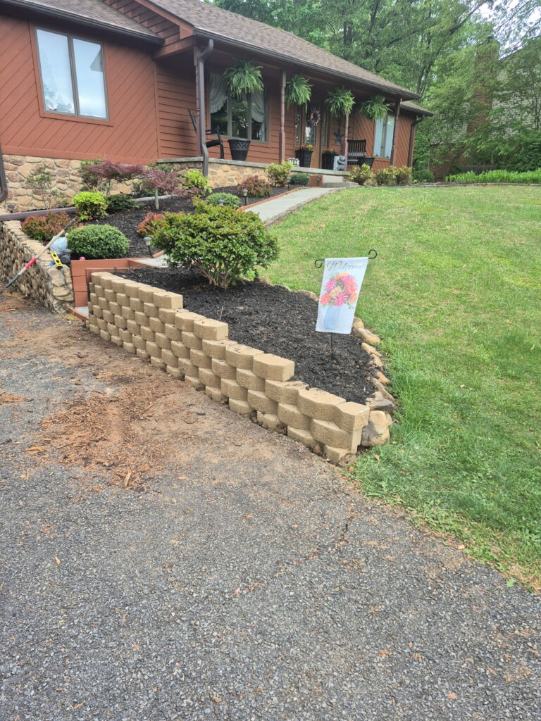 Professional stone retaining wall installation in Roanoke VA by Lopez Landscaping.
