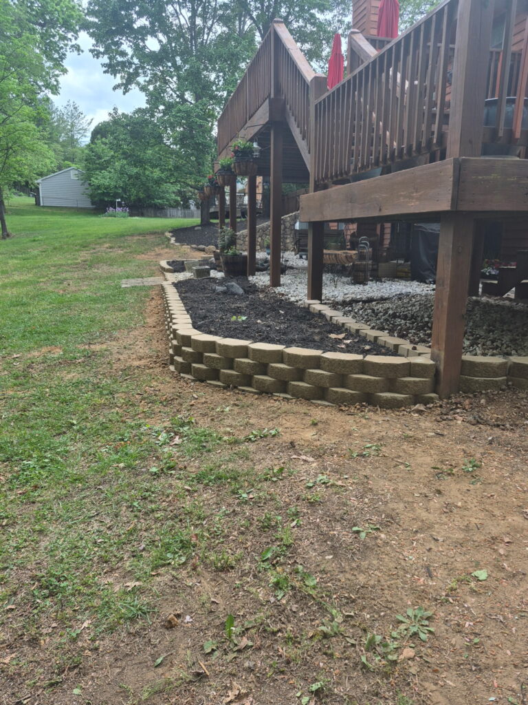 Professional stone retaining wall installation in Roanoke VA by Lopez Landscaping.